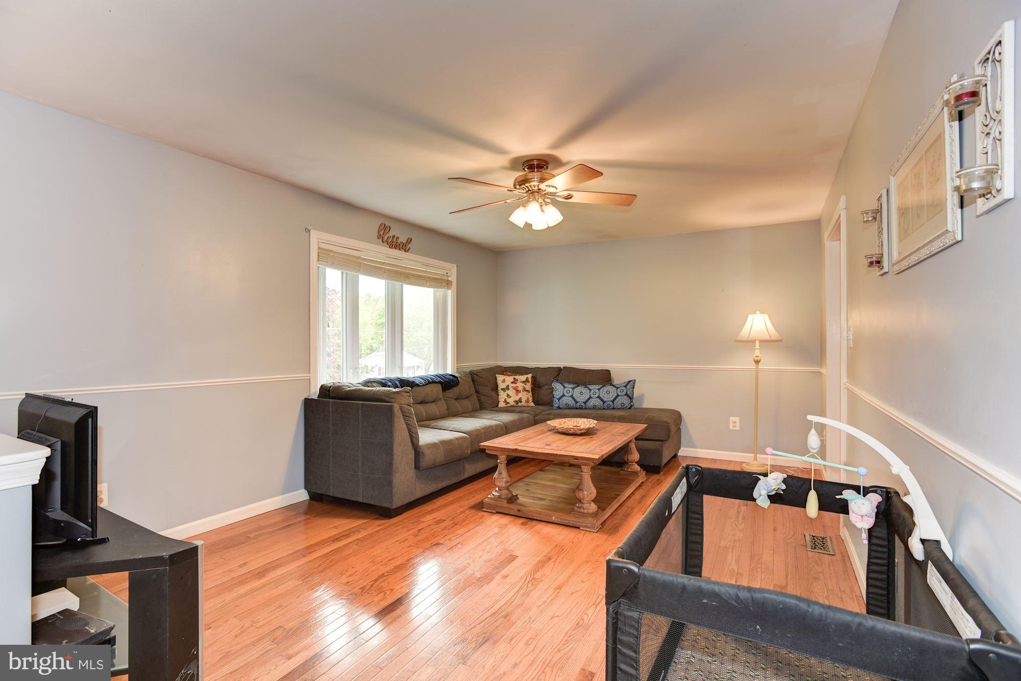 7349 Gaither Road Sykesville, MD 21784 - Photo 4 of 37 Living Room | Hardwood Floors | Bay Window