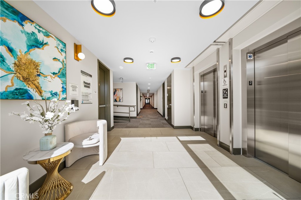 218 North El Molino Avenue, Unit 502 Pasadena, CA 91101 - Photo 23 of 35 a lobby with furniture and window