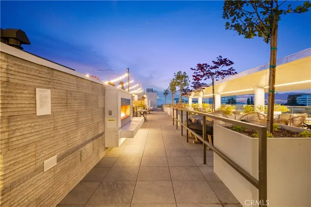 a lobby with furniture and a table