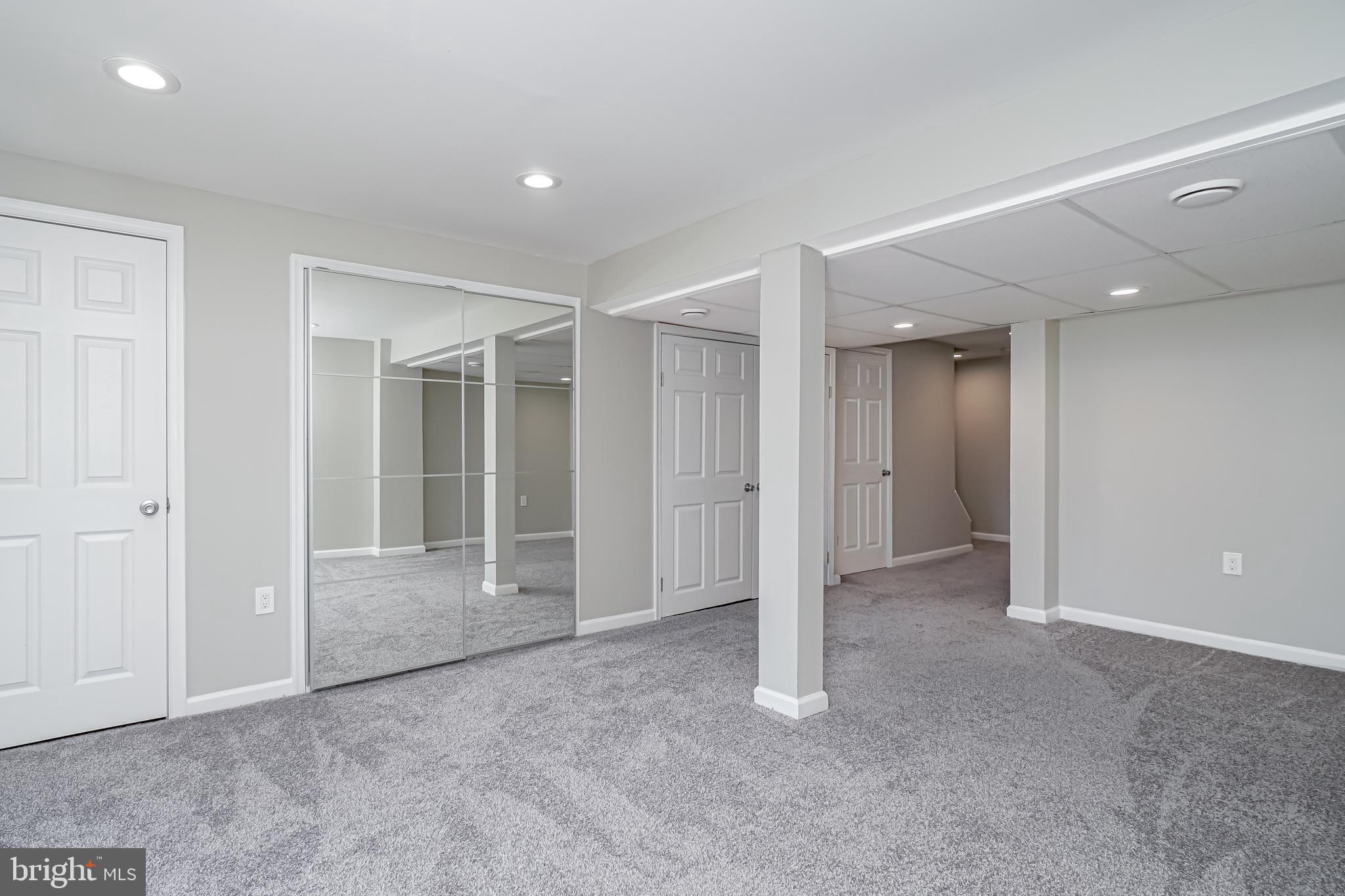 18 Hatteras Court Elkton, MD 21921 - Photo 19 of 21 an empty room with closet and windows