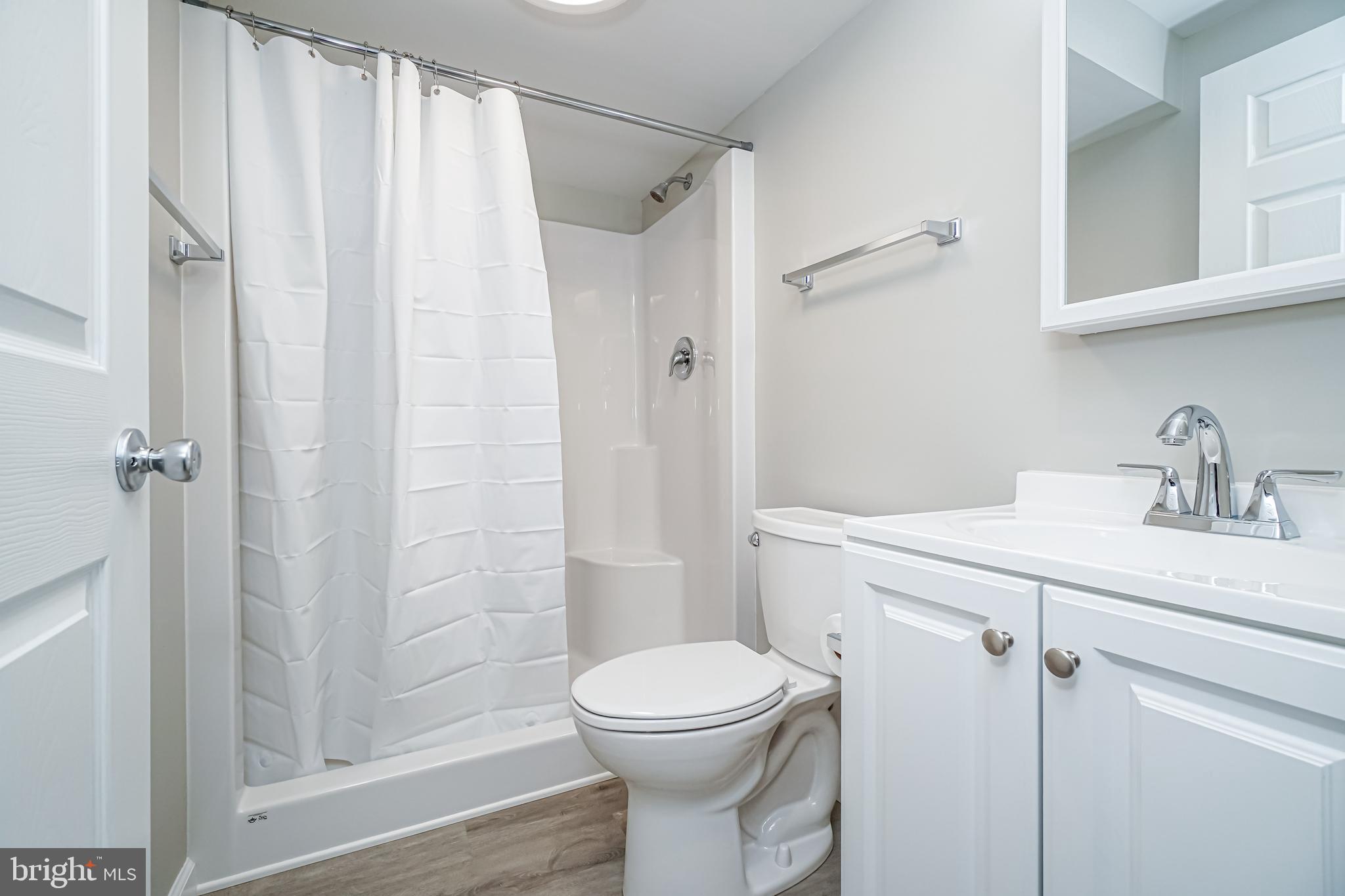 18 Hatteras Court Elkton, MD 21921 - Photo 20 of 21 a bathroom with a sink a toilet and shower