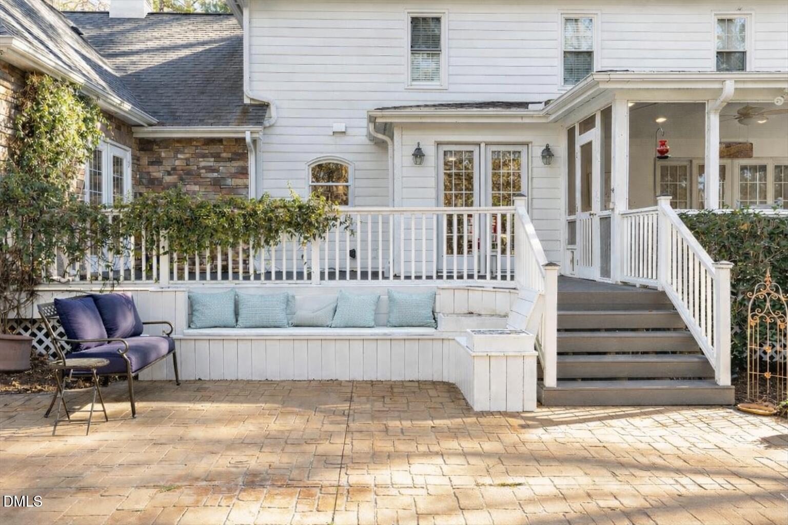 1849 Snow Wind Drive Raleigh, NC 27615 - Photo 11 of 49 Sunny patio with navy loveseat and cushi