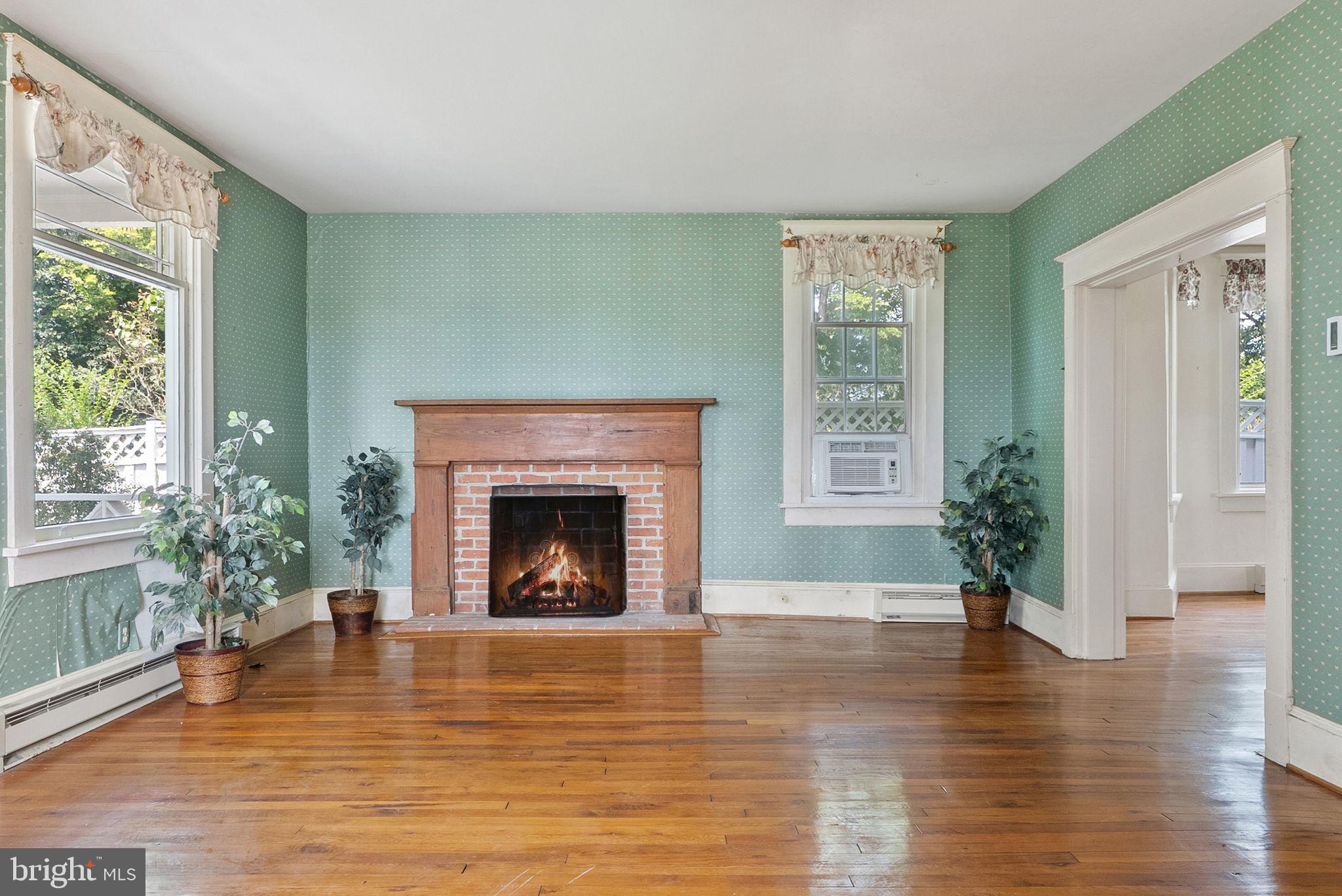 64 Salem Church Road Boyce, VA 22620 - Photo 13 of 59 a view of an empty room with window and fire place