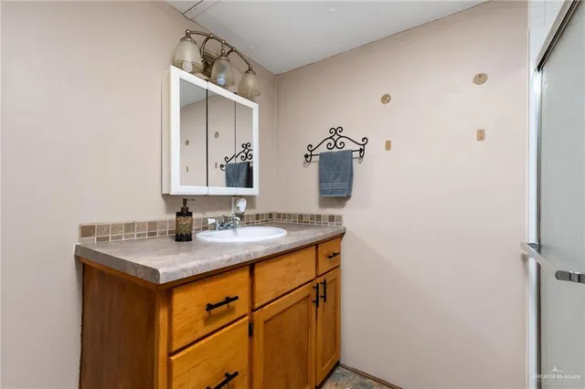 a storage room with washer and dryer