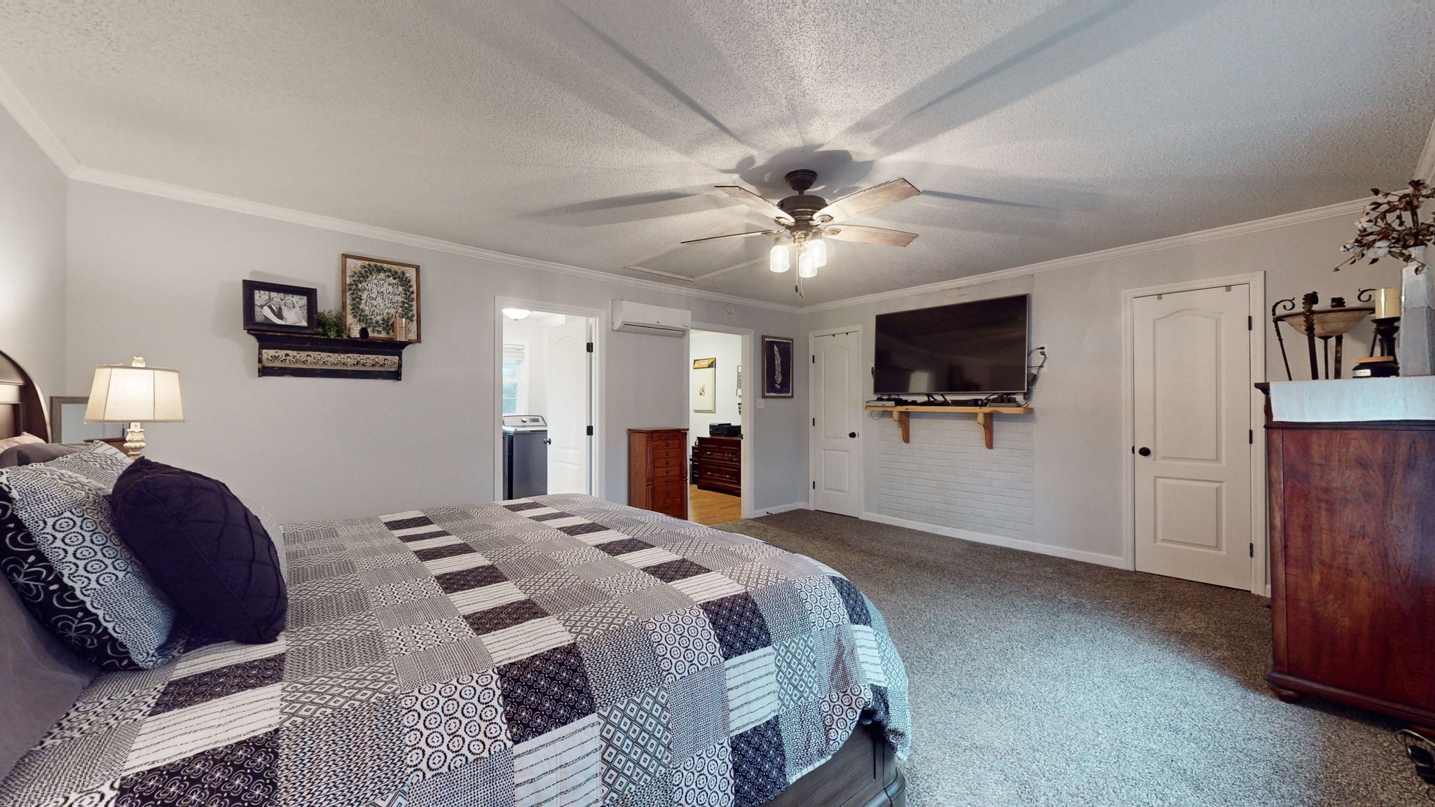 221 Limestone Road Elora, TN 37328 - Photo 31 of 47 a spacious bedroom with a bed and a flat screen tv