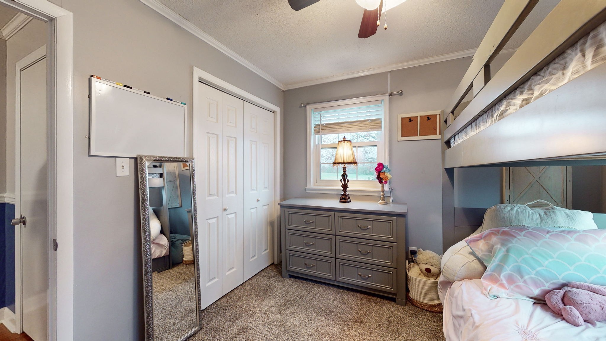 221 Limestone Road Elora, TN 37328 - Photo 35 of 47 a bedroom with a bed and a mirror
