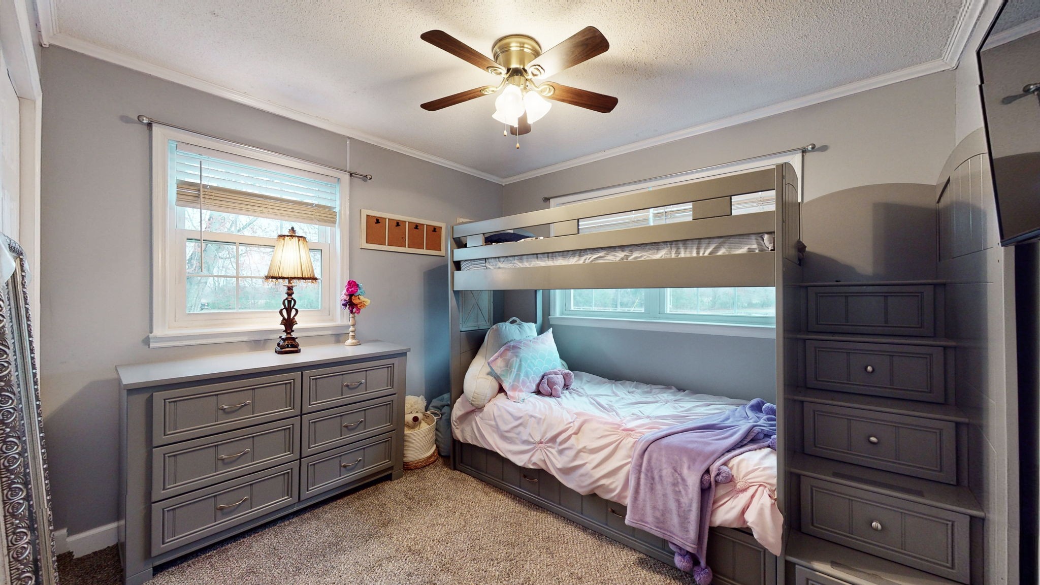221 Limestone Road Elora, TN 37328 - Photo 36 of 47 a bedroom with a bed and a chandelier