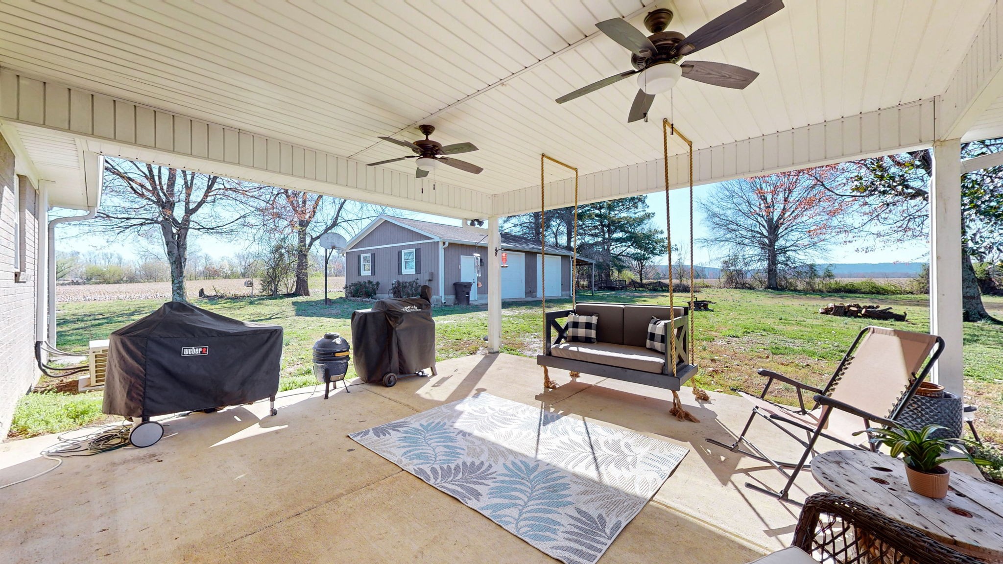 221 Limestone Road Elora, TN 37328 - Photo 7 of 47 a living room with patio furniture and a floor to ceiling window