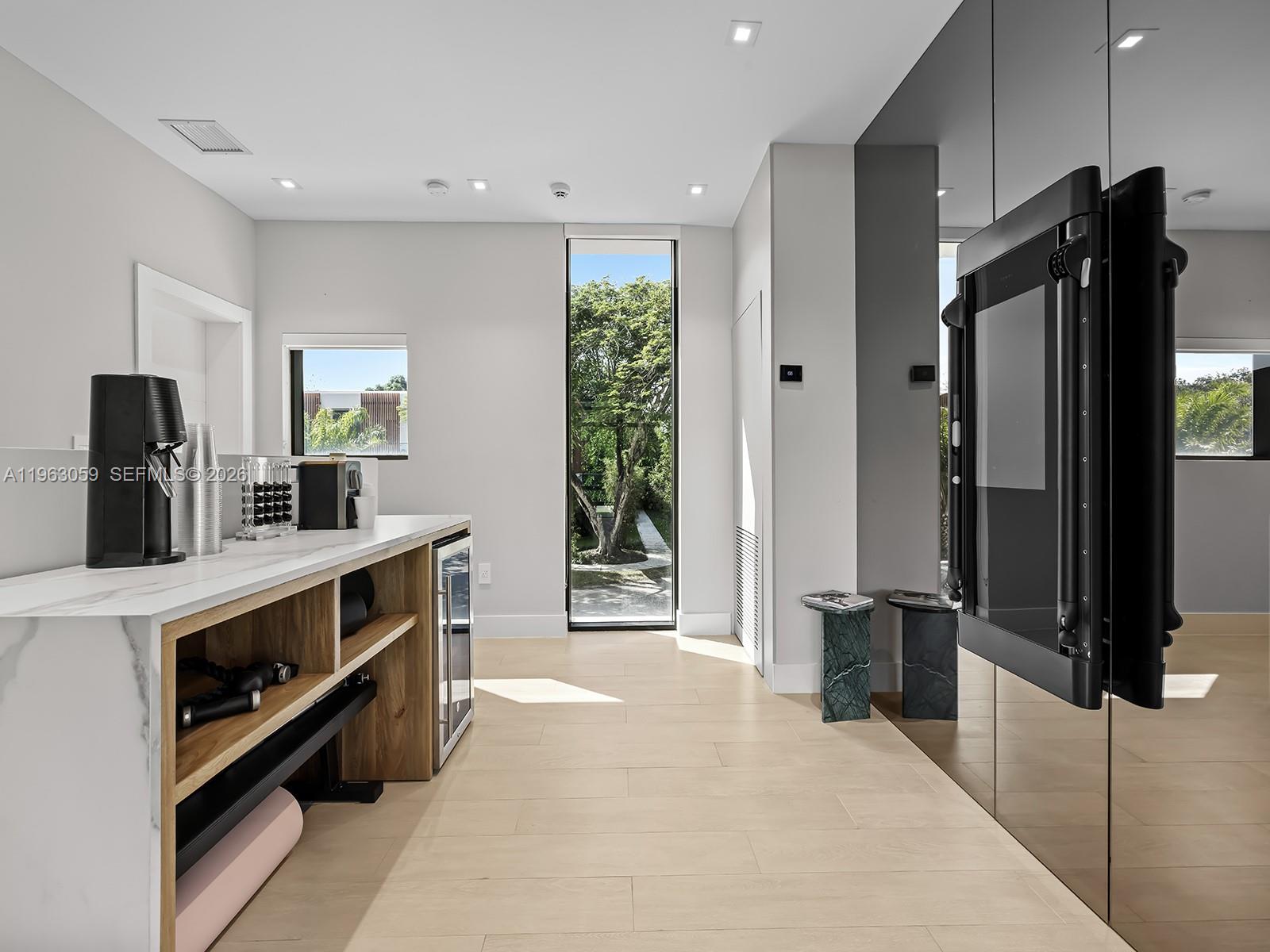 7701 Southwest 50th Court Miami, FL 33143 - Photo 11 of 19 Wet bar/Landing area