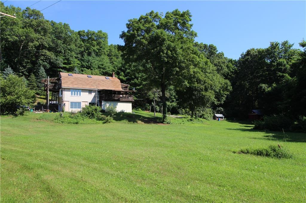 334 Jerusalem Road Windham, CT 06280 - Photo 1 of 1 a front view of a house with a yard