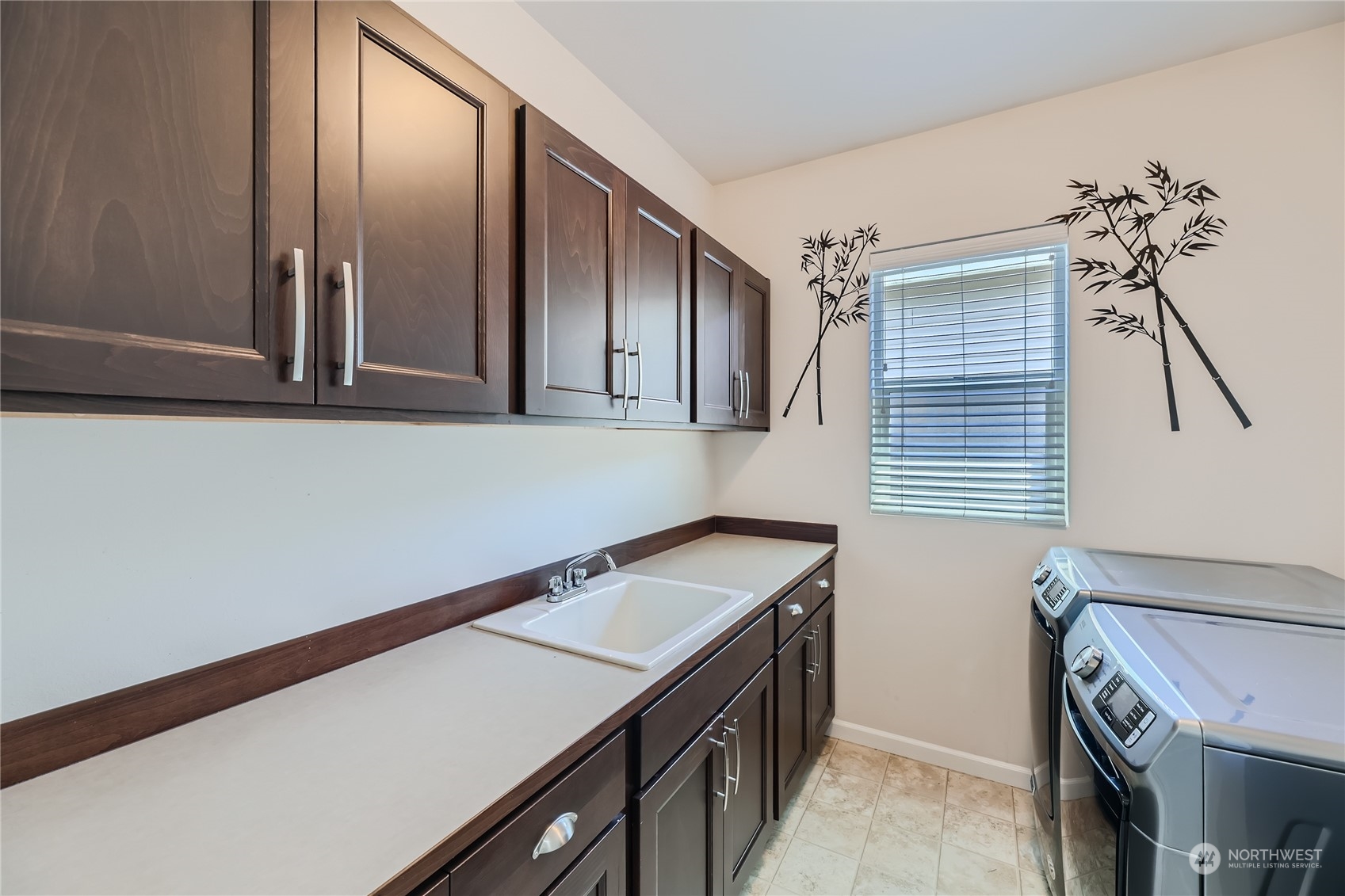 3606 196th Place Southeast Bothell, WA 98012 - Photo 33 of 39 a utility room with cabinets