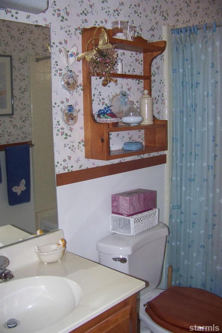 760 Hot Springs Road Markleeville, CA 96120 - Photo 26 of 28 a bathroom with a toilet and a sink