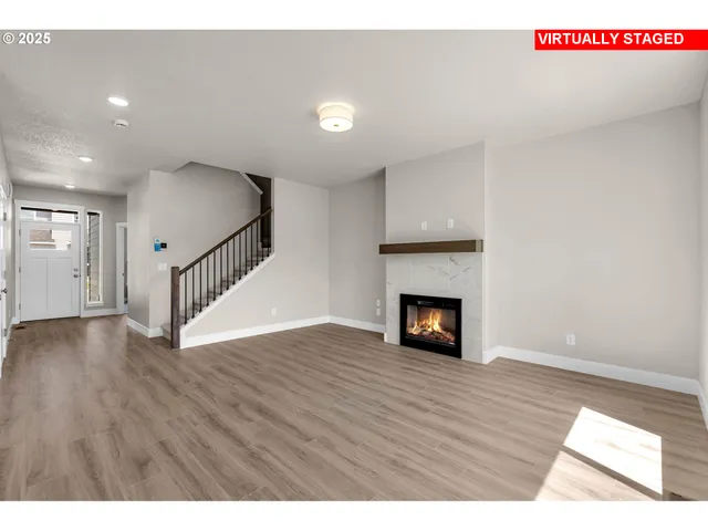 a kitchen with stainless steel appliances kitchen island wooden cabinets and granite counter tops