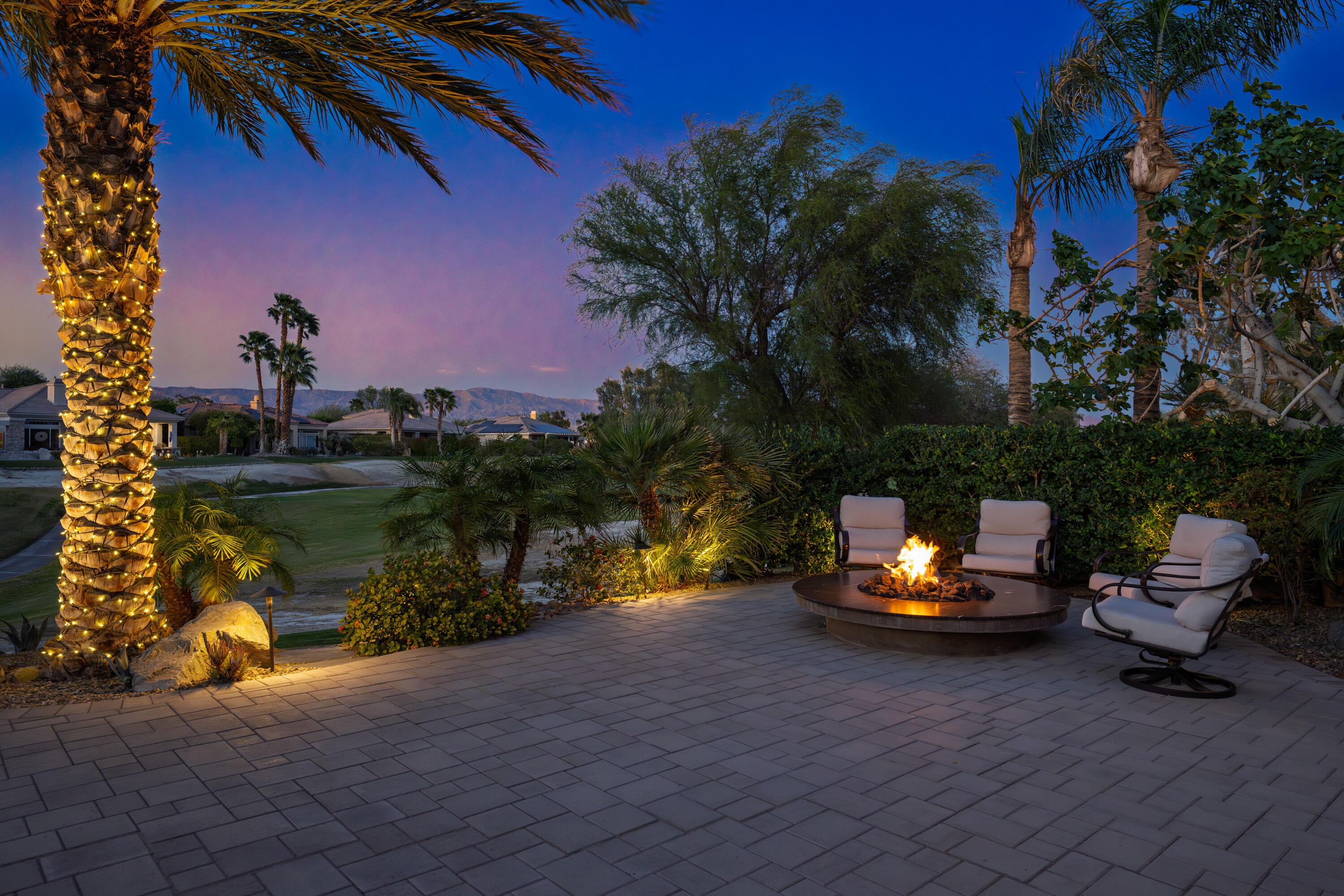 269 Loch Lomond Road Rancho Mirage, CA 92270 - Photo 5 of 53 a lake view with a bench and lake view