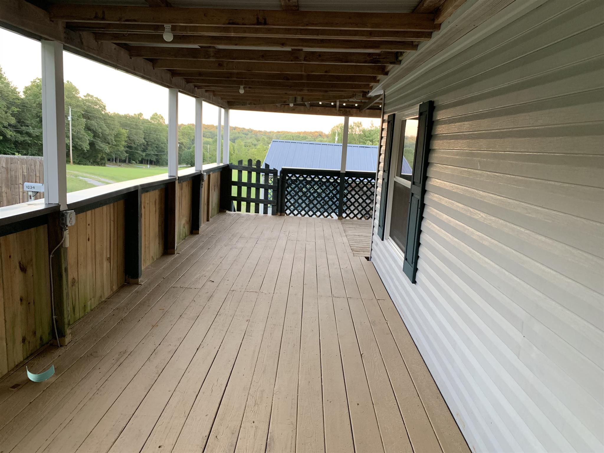 1034 Absher Branch Road Westmoreland, TN 37186 - Photo 16 of 27 Sit on the Covered Porch and Enjoy the Peacefulness