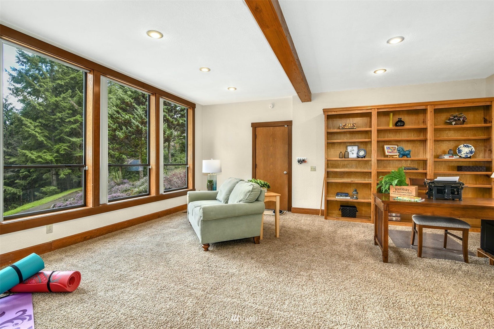 1160 Ridgewood Place Southwest Issaquah, WA 98027 - Photo 14 of 39 a living room with furniture and a floor to ceiling window