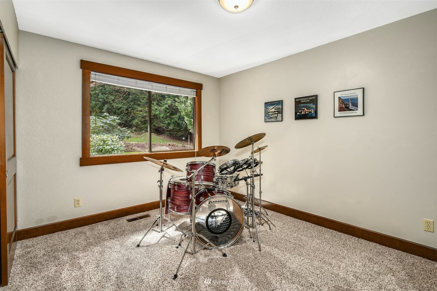 1160 Ridgewood Place Southwest Issaquah, WA 98027 - Photo 24 of 39 a view of workspace with wooden floor and windows