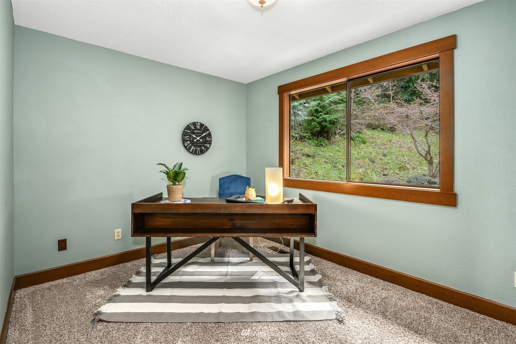 1160 Ridgewood Place Southwest Issaquah, WA 98027 - Photo 25 of 39 a view of a workspace with a table and a potted plant