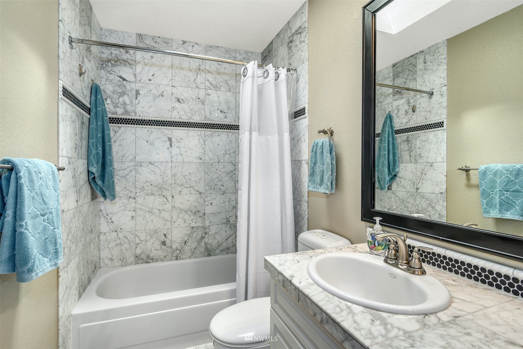 1160 Ridgewood Place Southwest Issaquah, WA 98027 - Photo 26 of 39 a bathroom with a granite countertop sink toilet and shower