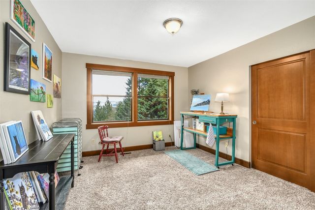 a backyard of a house with outdoor seating