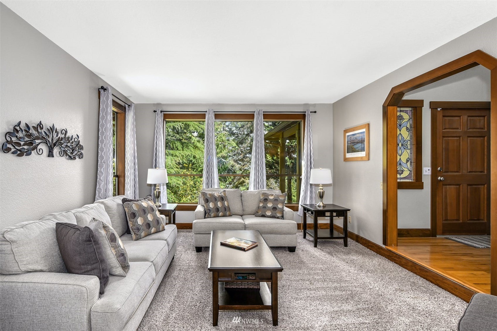1160 Ridgewood Place Southwest Issaquah, WA 98027 - Photo 5 of 39 a living room with furniture and a large window