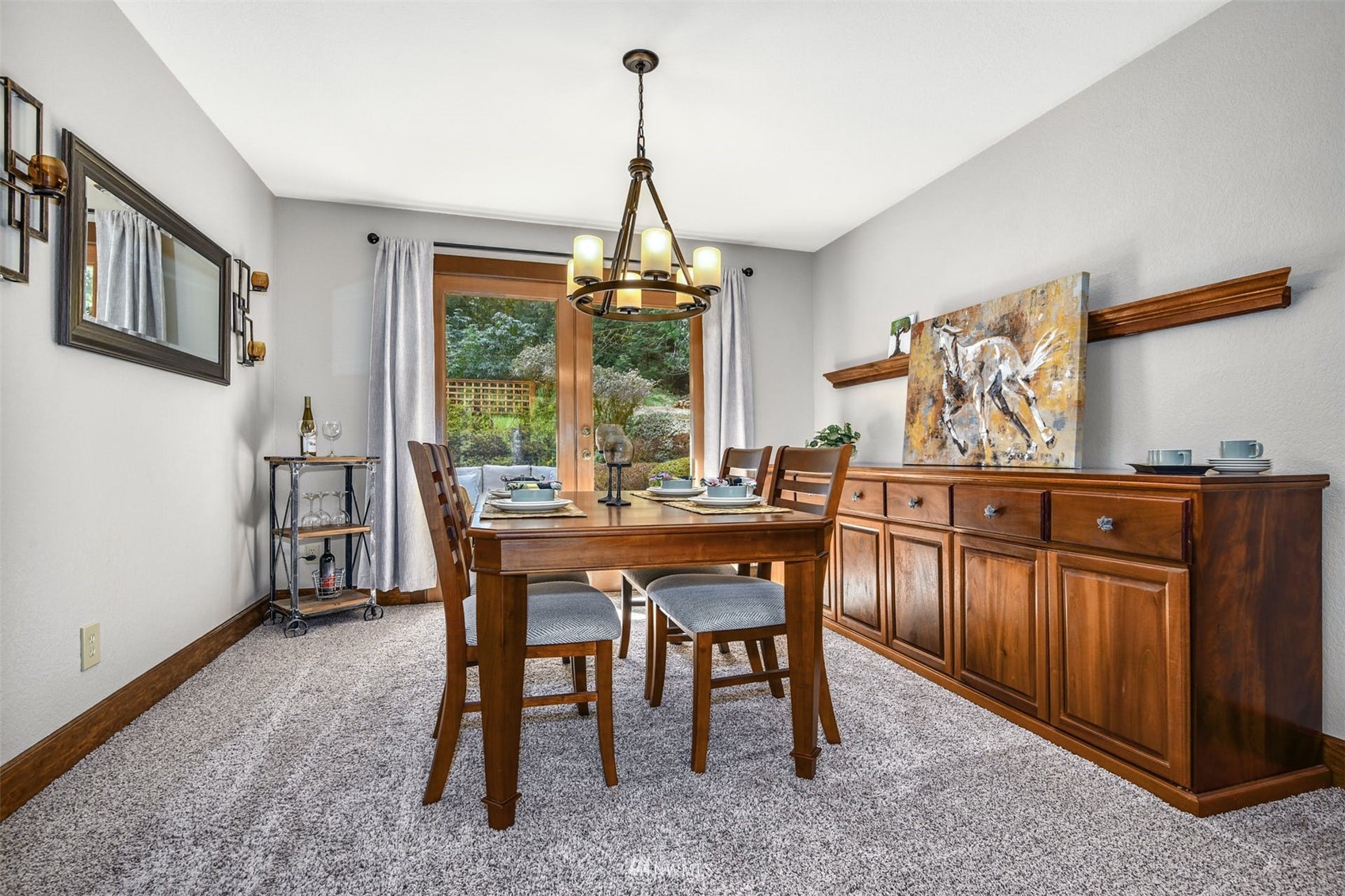1160 Ridgewood Place Southwest Issaquah, WA 98027 - Photo 7 of 39 a dining room with wooden floor a chandelier a wooden table and chairs