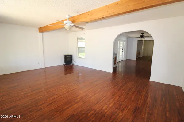 a view of a livingroom with wooden floor