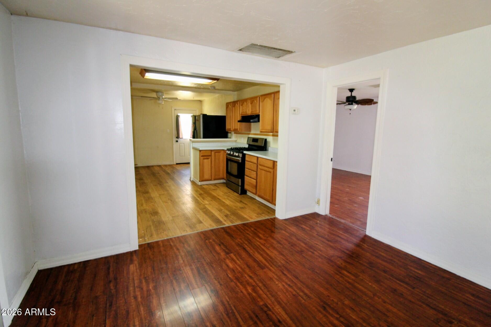 5733 Globe Canyon Road Globe, AZ 85501 - Photo 14 of 30 a view of a living room and wooden floor