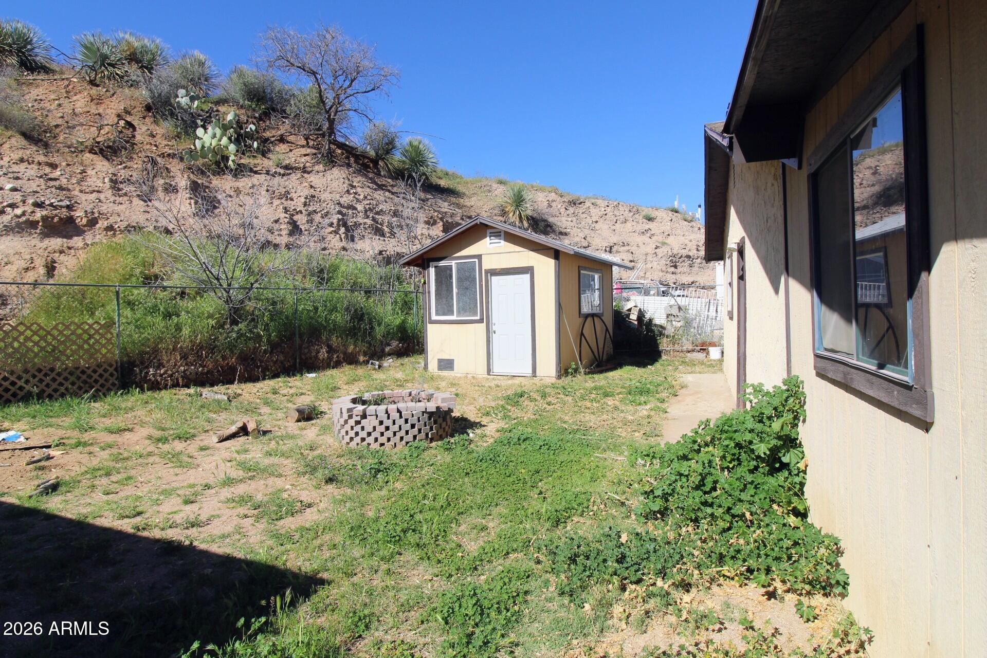 5733 Globe Canyon Road Globe, AZ 85501 - Photo 9 of 30 a view of a house with a yard
