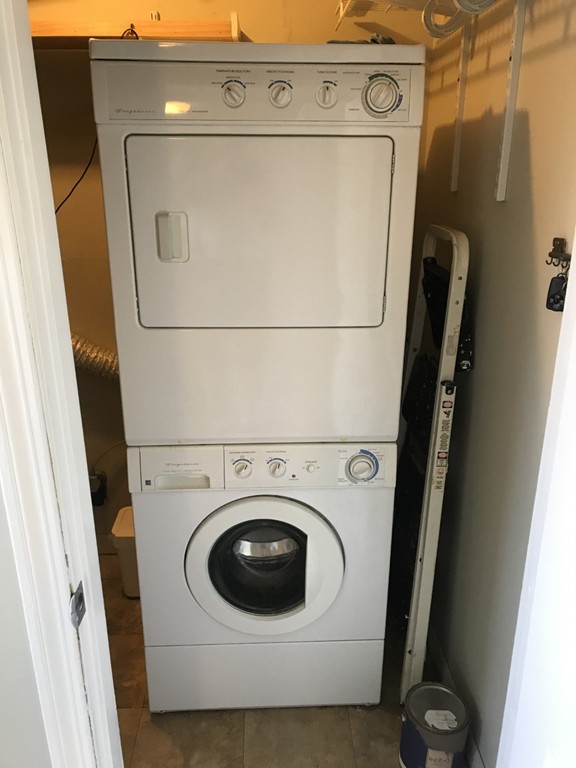 1 Markham Circle, Unit D Ayer, MA 01432 - Photo 12 of 13 a utility room with dryer and washer