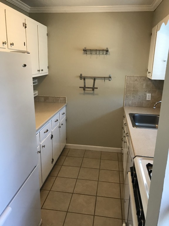1 Markham Circle, Unit D Ayer, MA 01432 - Photo 3 of 13 a view of utility room