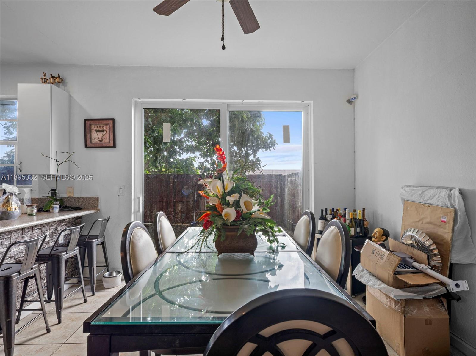 2104 Northeast 3rd Court Homestead, FL 33033 - Photo 15 of 35 a dining room with furniture and wooden floor
