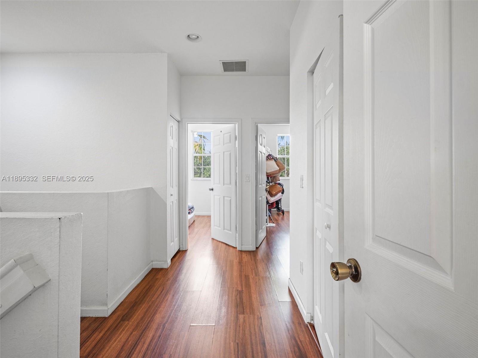 2104 Northeast 3rd Court Homestead, FL 33033 - Photo 16 of 35 wooden floor in a gallery