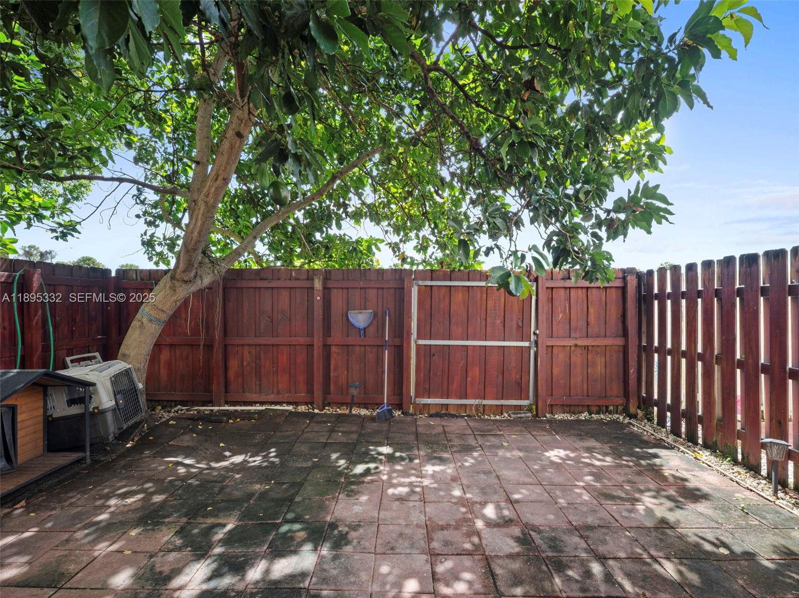 2104 Northeast 3rd Court Homestead, FL 33033 - Photo 29 of 35 a view of a backyard with small cabin