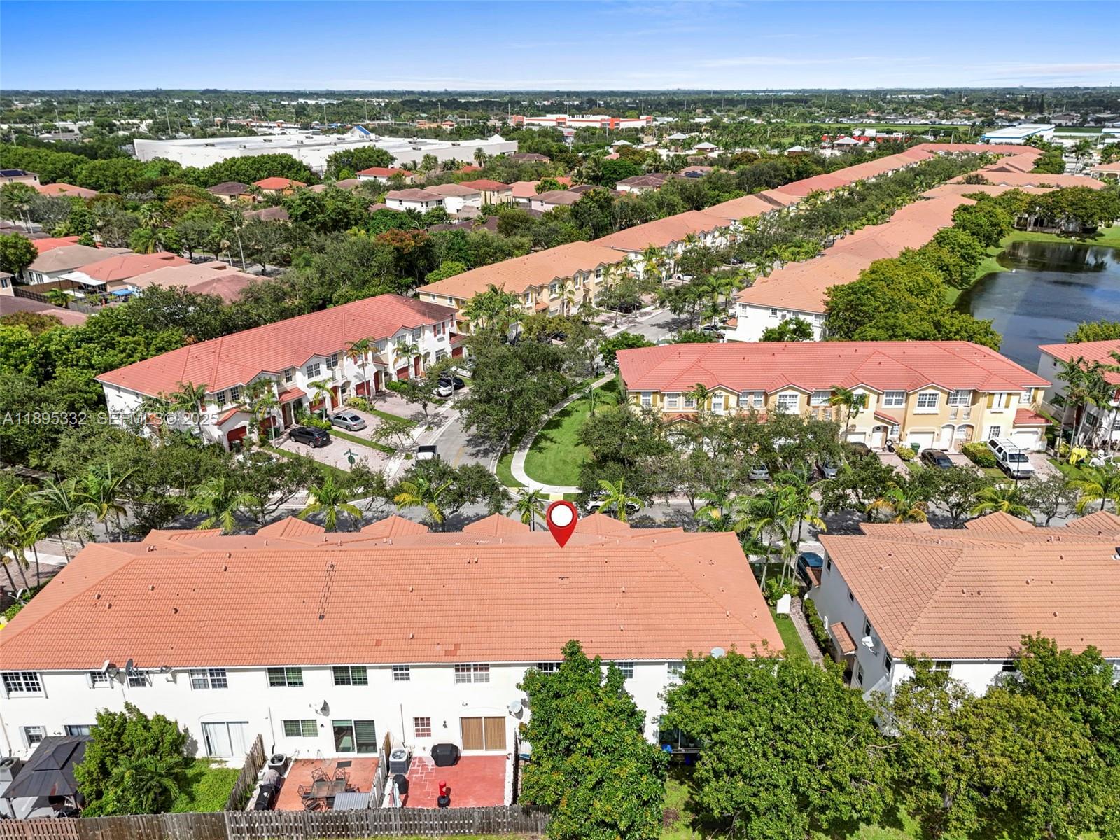 2104 Northeast 3rd Court Homestead, FL 33033 - Photo 31 of 35 an aerial view of residential houses with outdoor space