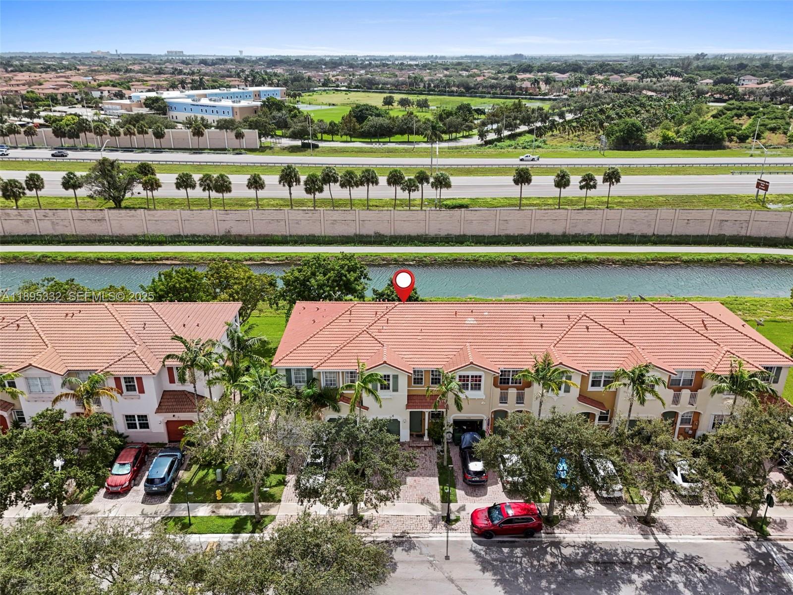 2104 Northeast 3rd Court Homestead, FL 33033 - Photo 32 of 35 an aerial view of a house with a garden