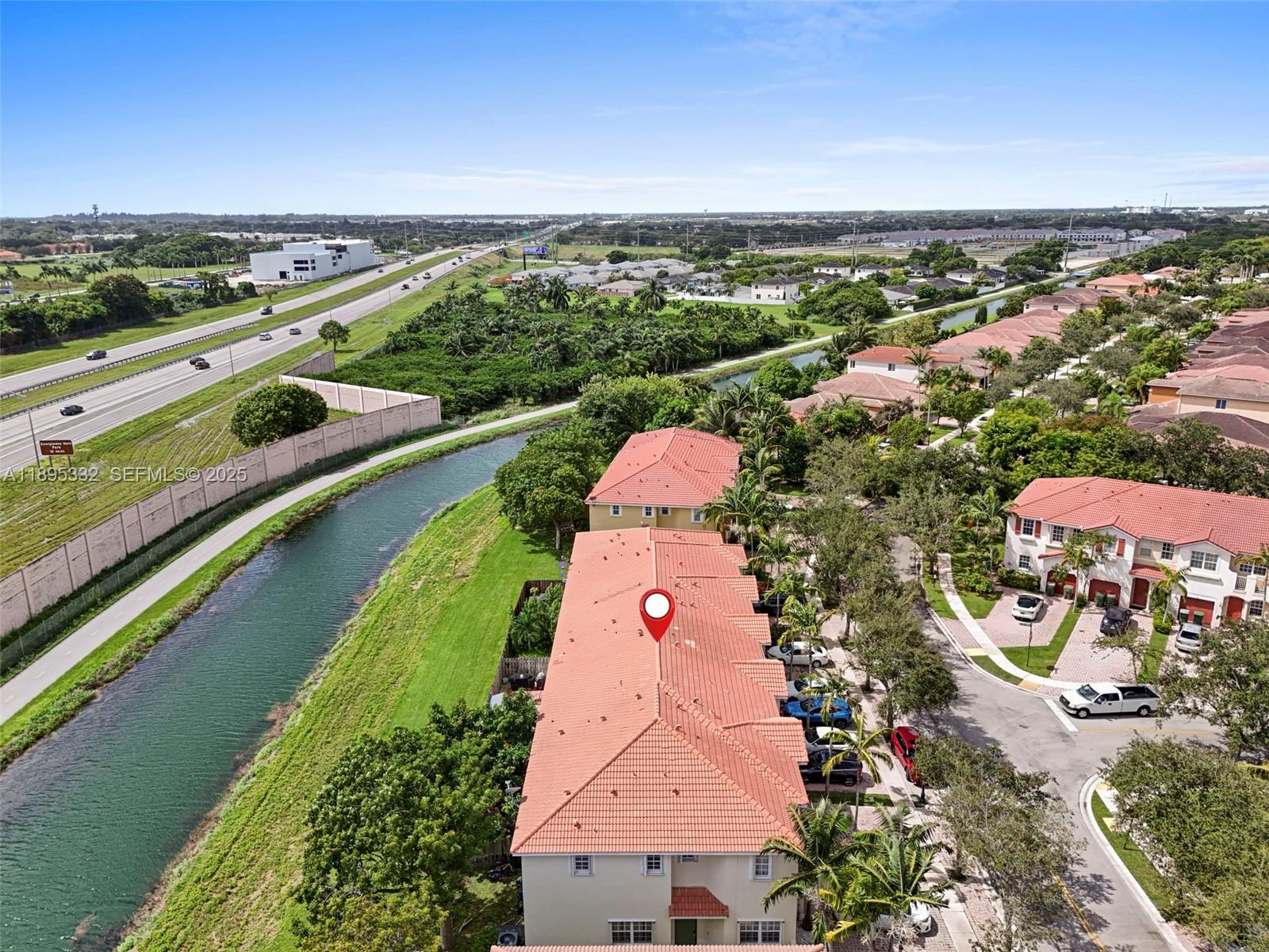 2104 Northeast 3rd Court Homestead, FL 33033 - Photo 34 of 35 an aerial view of lake residential houses with outdoor space and river