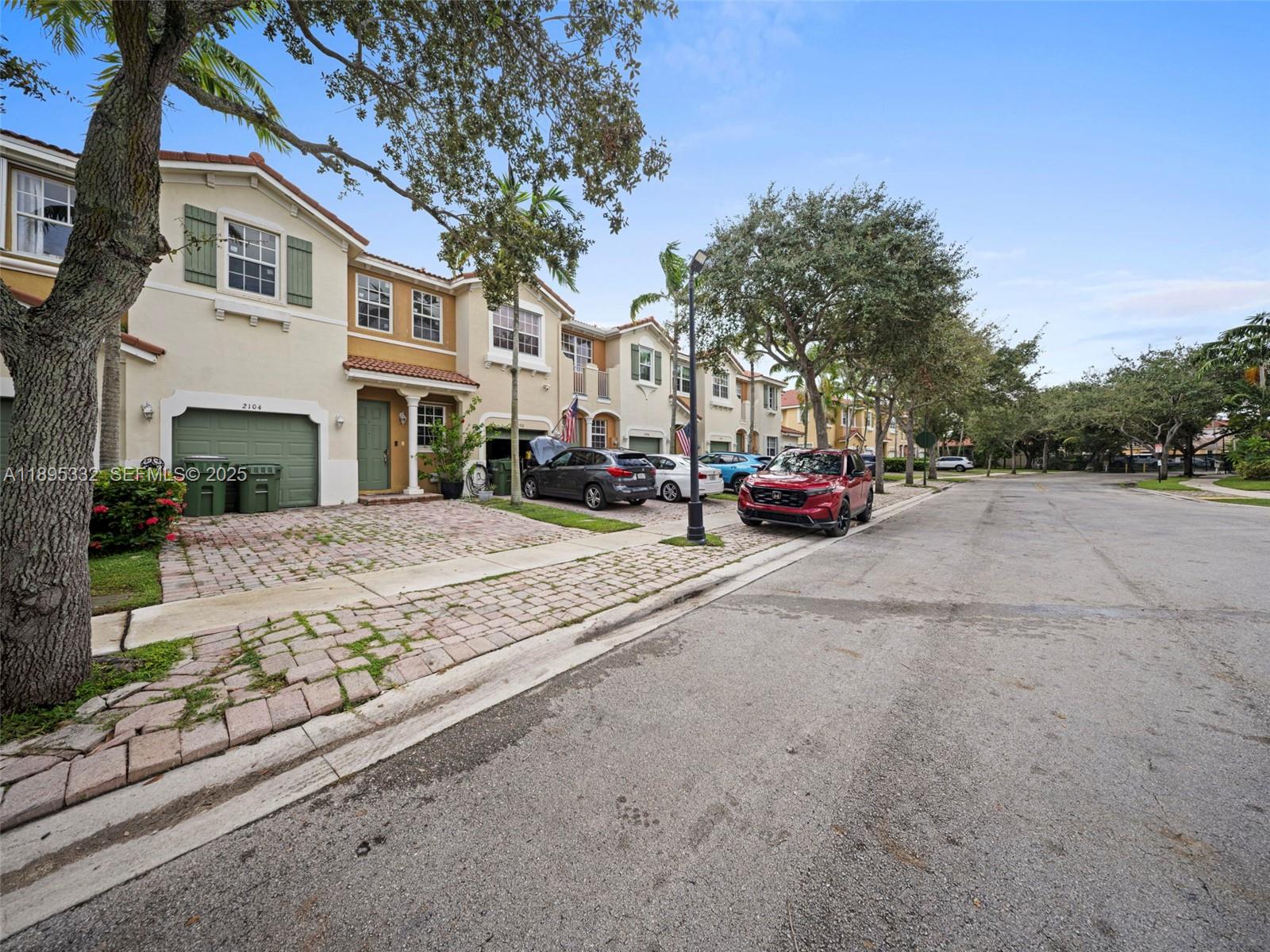 2104 Northeast 3rd Court Homestead, FL 33033 - Photo 4 of 35 a view of street with large buildings