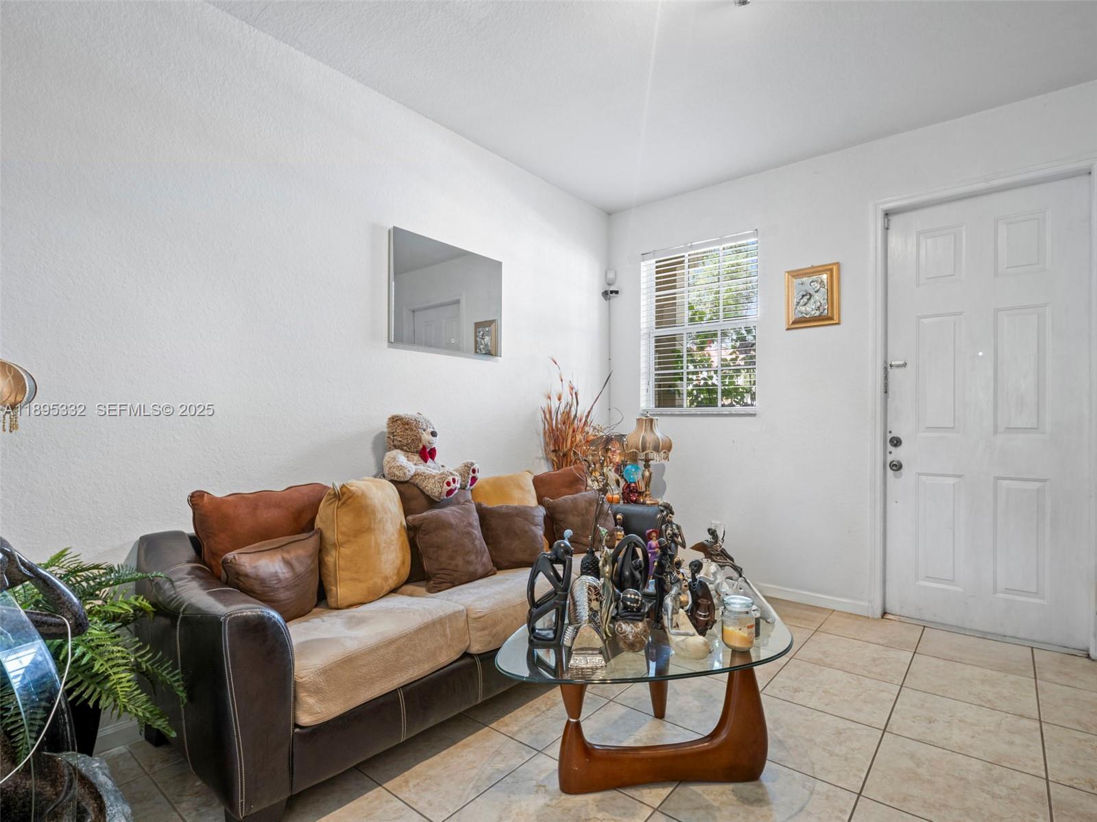 2104 Northeast 3rd Court Homestead, FL 33033 - Photo 8 of 35 a living room with furniture