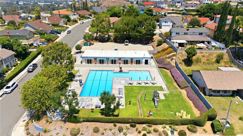 20948 Center Street Riverside, CA 92507 - Photo 79 of 92 an aerial view of residential houses with yard and swimming pool