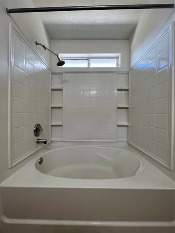 a bathroom with a bathtub