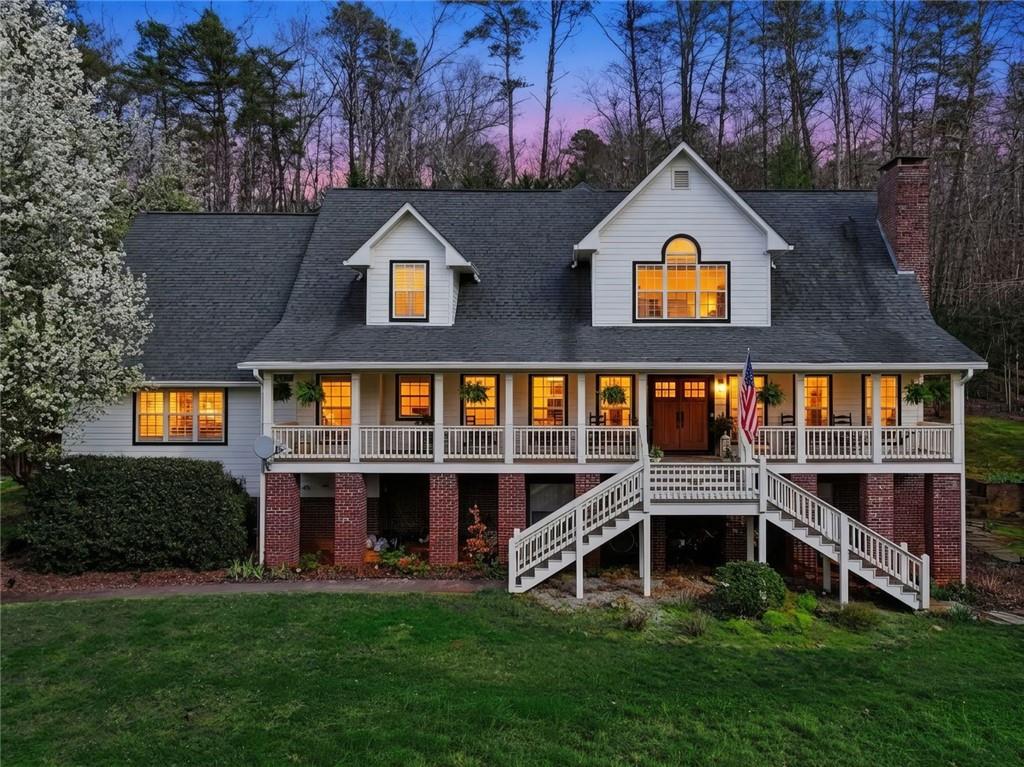1852 Oak Grove Road Dahlonega, GA 30533 - Photo 1 of 68 a view of a house with a yard