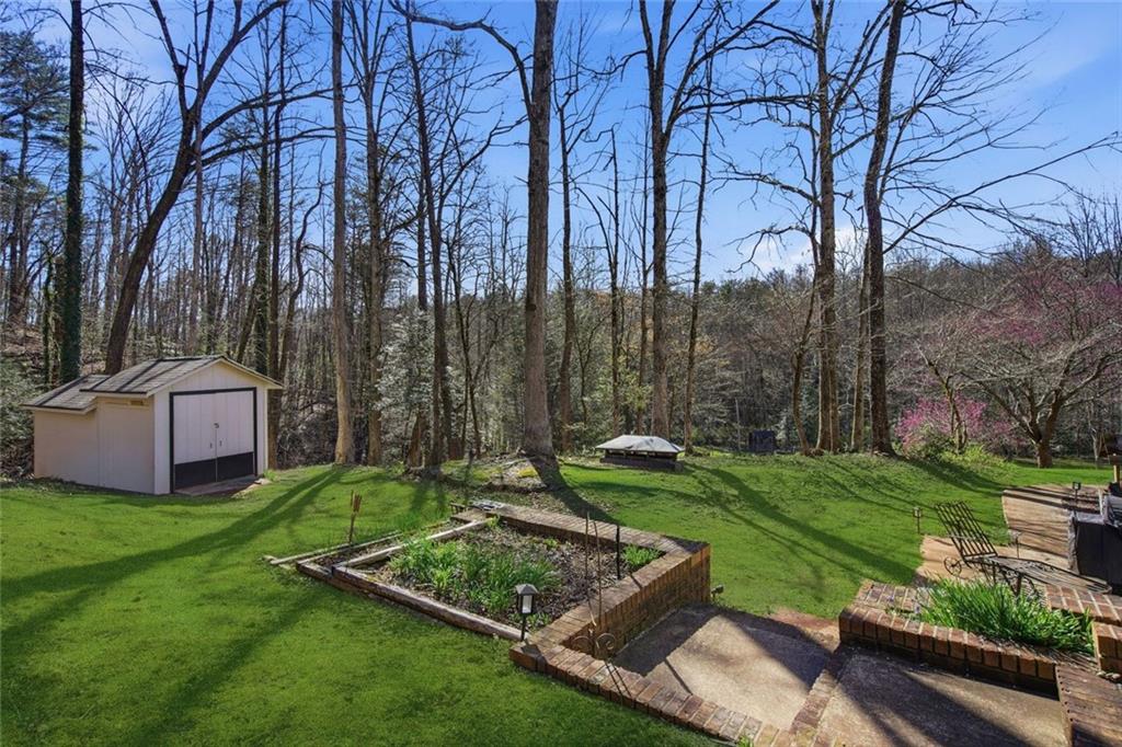 1852 Oak Grove Road Dahlonega, GA 30533 - Photo 19 of 68 a view of a backyard with sitting area