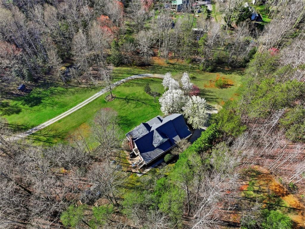 1852 Oak Grove Road Dahlonega, GA 30533 - Photo 24 of 68 a view of a garden with a yard