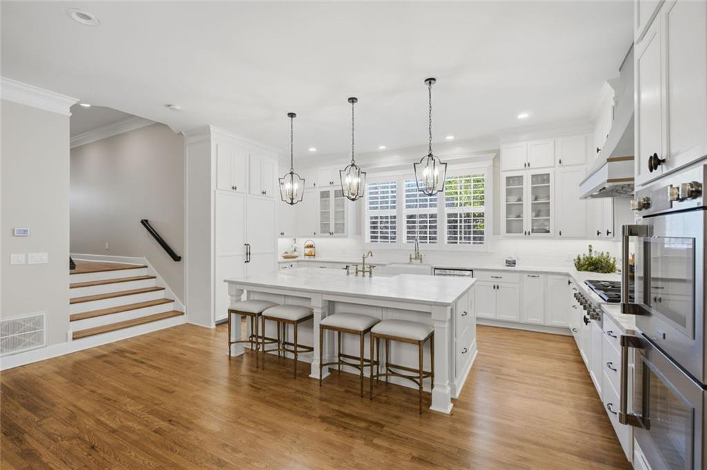 1852 Oak Grove Road Dahlonega, GA 30533 - Photo 30 of 68 a large kitchen with a table and chairs