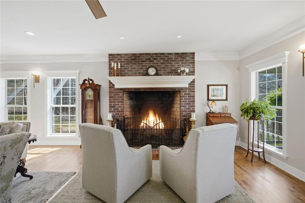 1852 Oak Grove Road Dahlonega, GA 30533 - Photo 34 of 68 a living room with furniture and a fireplace