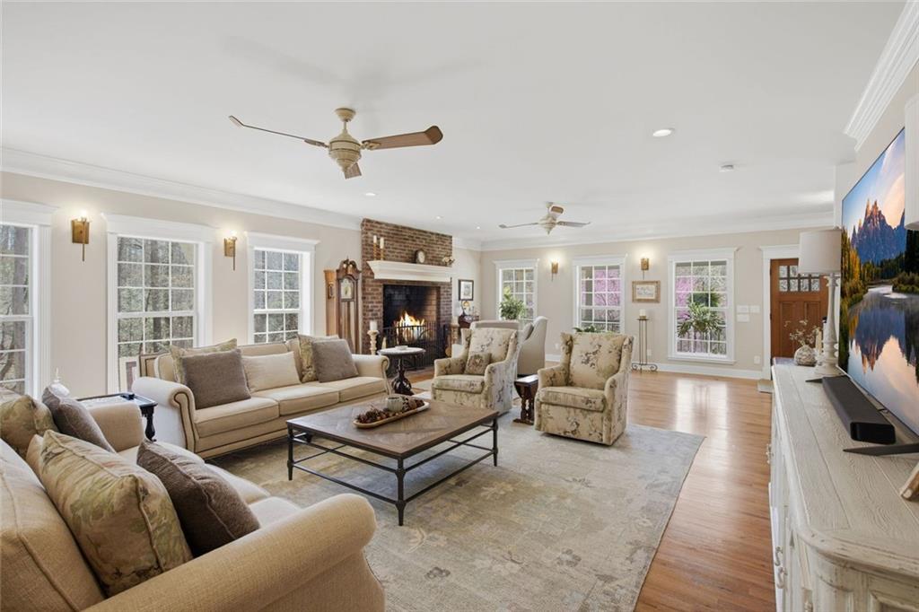 1852 Oak Grove Road Dahlonega, GA 30533 - Photo 38 of 68 a living room with furniture ceiling fan and a rug