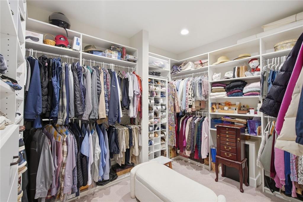 1852 Oak Grove Road Dahlonega, GA 30533 - Photo 43 of 68 a view of walk in closet with clothes and shoes