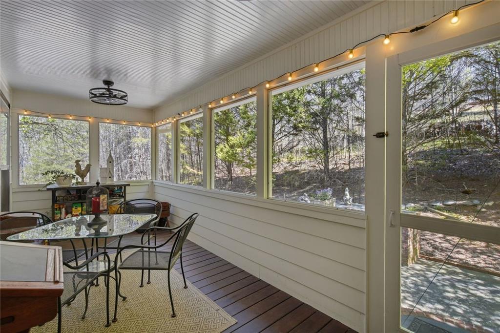 1852 Oak Grove Road Dahlonega, GA 30533 - Photo 45 of 68 a view of a dining room with furniture window and outside view