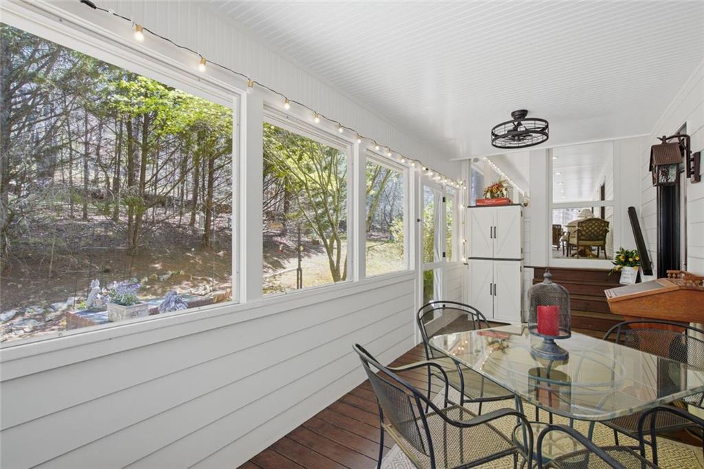1852 Oak Grove Road Dahlonega, GA 30533 - Photo 46 of 68 a view of a dining room with furniture window and outside view